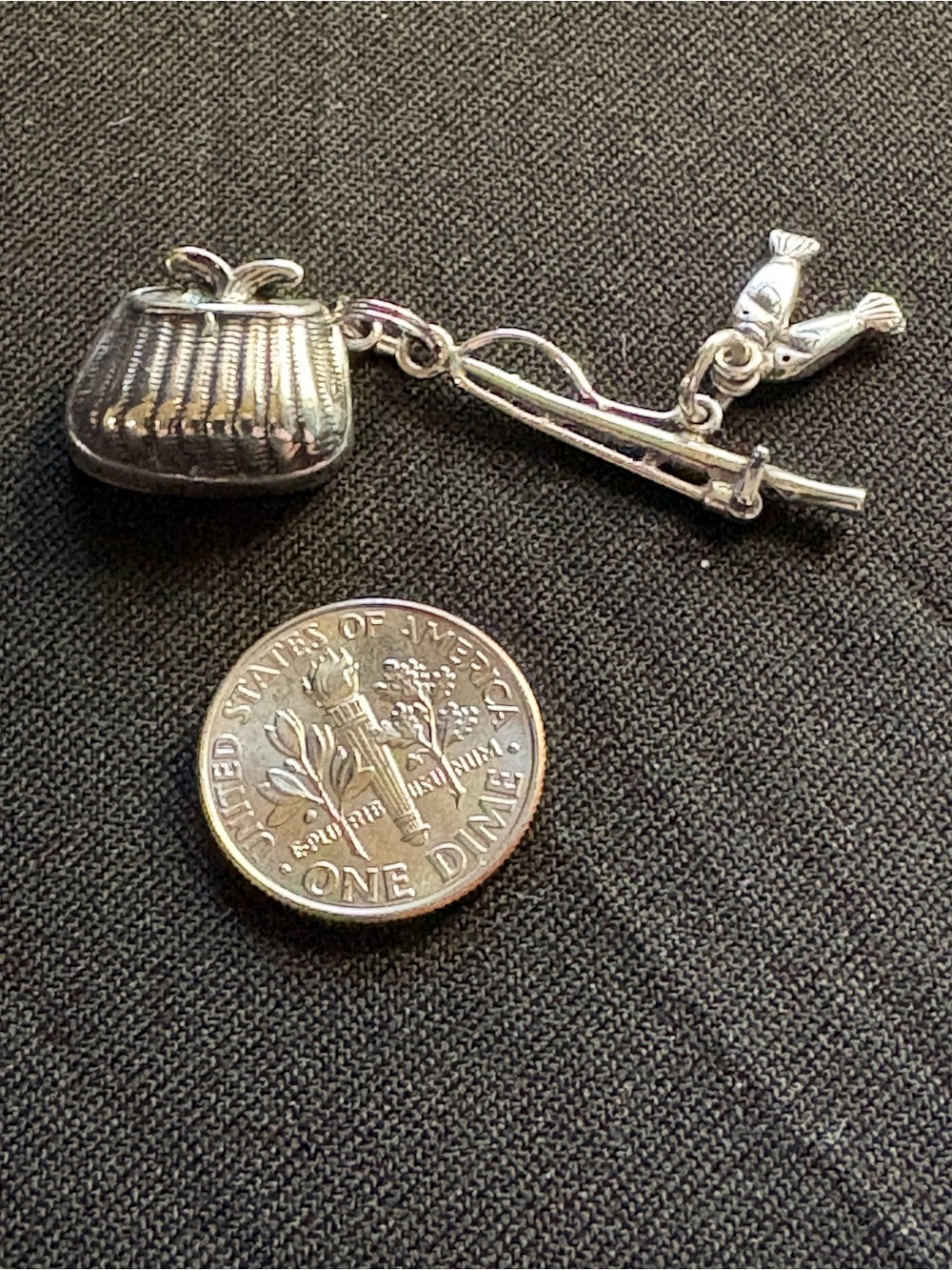 Vintage sterling silver creel with rod, reel and fish.  Sterling but not Stamped
